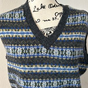 100% Pure new wool Brora v neck sweater vest. Perfect for layering.